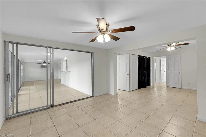 Looking into master bedroom from the office area