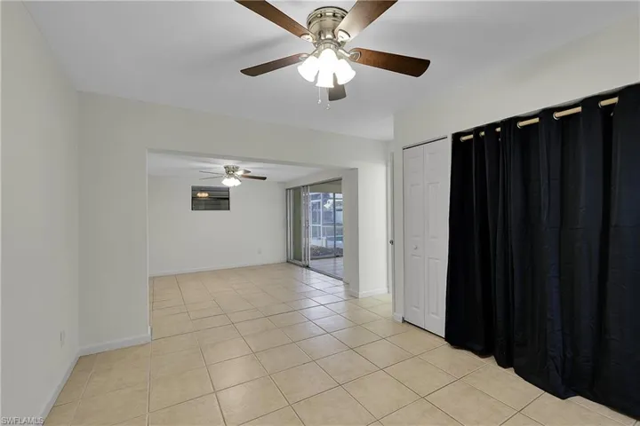 Viewing into master bedroom featuring a large office space