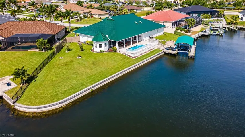 Bird's eye view featuring a water view and a residential view