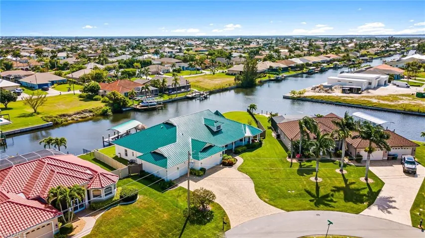 Aerial view with a residential view and a water view