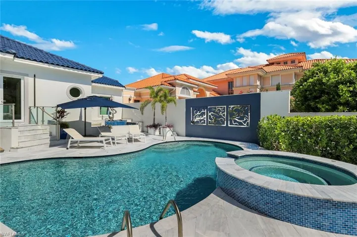 Southern exposure in the front gives the pool sun all year long.