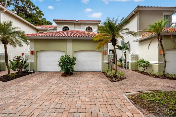 leading to garage and entry courtyard