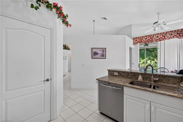 Kitchen looking to living room behind the non-load bearing wall