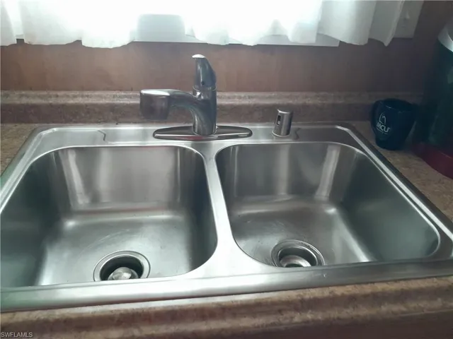 Room details featuring double sink