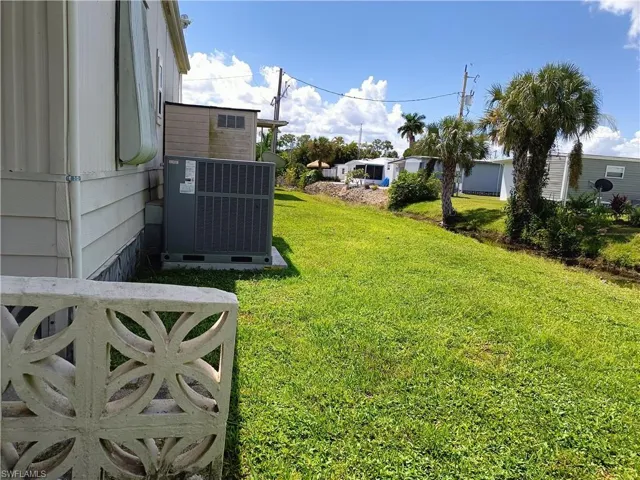 View of yard featuring central AC