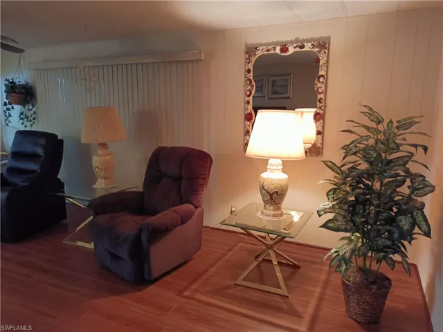 Living area featuring wood-type flooring