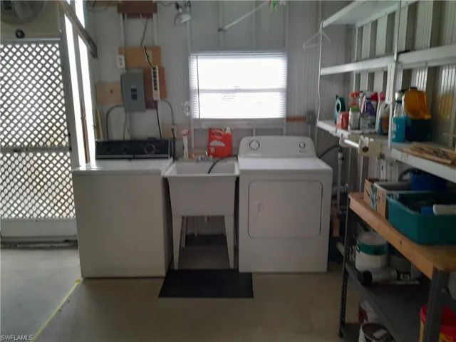 Laundry area with washer and dryer TUB SINK