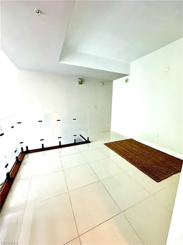 View of tiled spare room