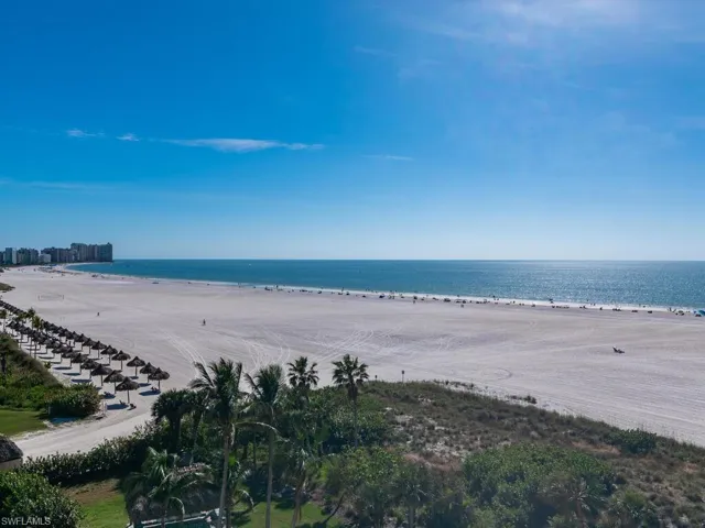 View of water feature with a beach view