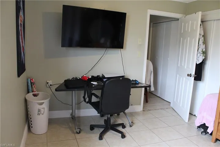 Office featuring light tile patterned floors