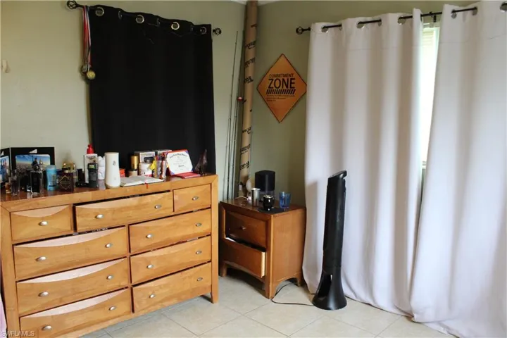 Bedroom featuring light tile patterned floors