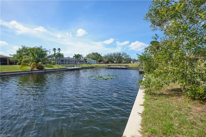 View of water feature with a boat dock