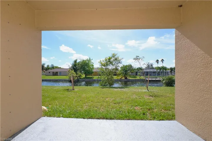 View of yard with a water view