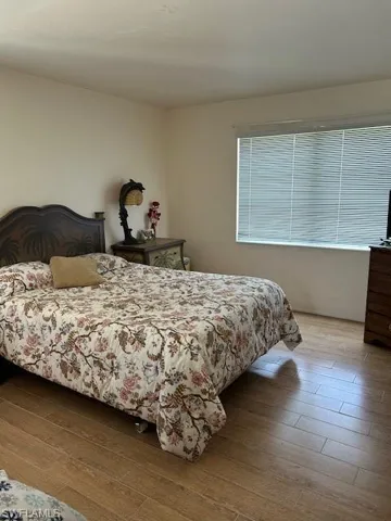 Bedroom featuring hardwood / wood-style floors
