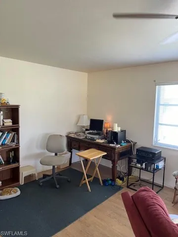 Office space featuring hardwood / wood-style floors