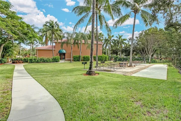 View of home's community featuring a yard and a patio