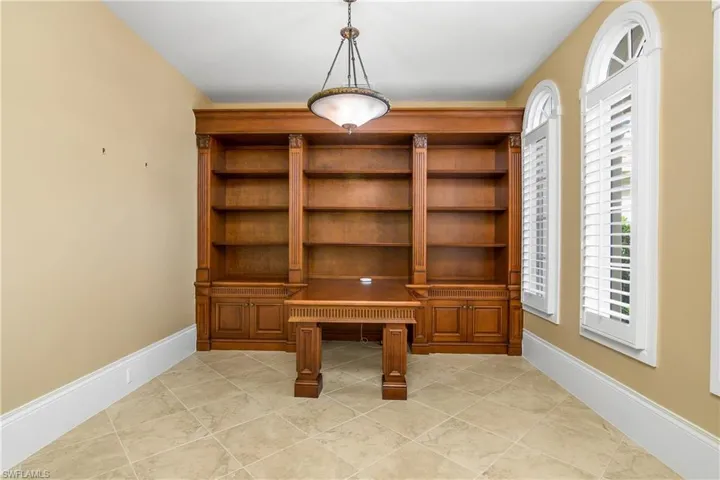 First floor office/study with built in "dual" desk.