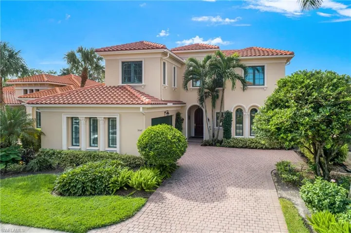 Informal elegance with one of the best lake lanai views in Shadow Wood. Four ensuite bedrooms (master on first floor) plus den, 5 baths (one is powder room) and 2-vehicle garage.