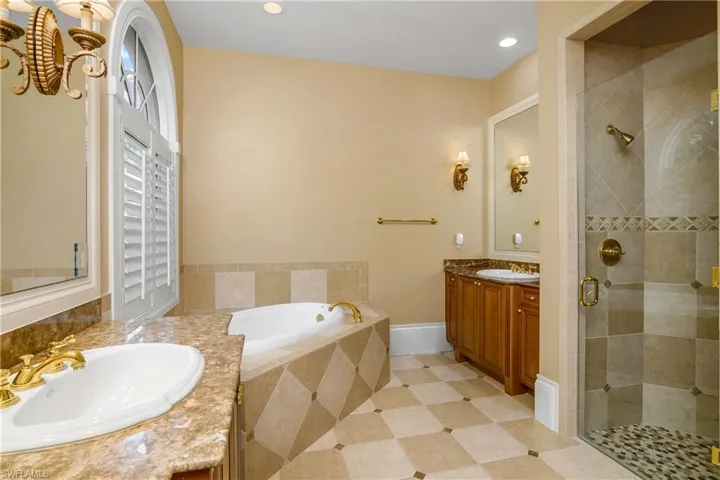 Master bath with separate shower and soaking tub, dual sinks