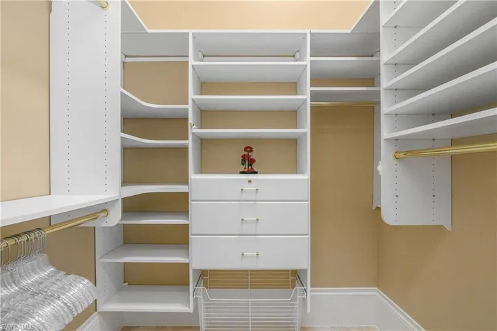 Two custom closets in owner's suite