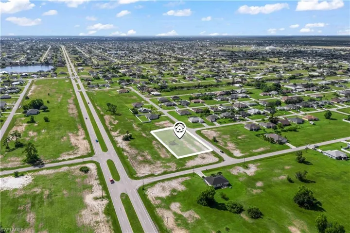 Bird’s-eye view showing how close the lots are to Diplomat Parkway, yet tucked away in a calm residential zone.