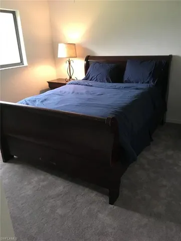 Bedroom with carpet flooring