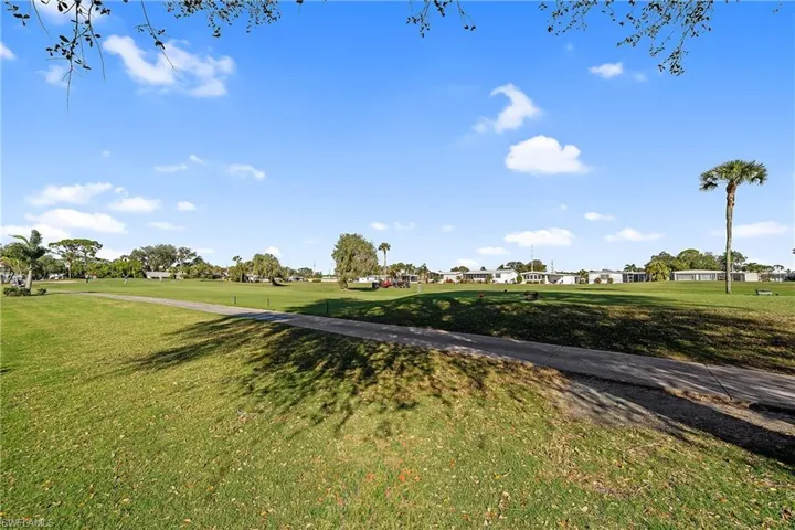 View of street with a residential view and golf course view