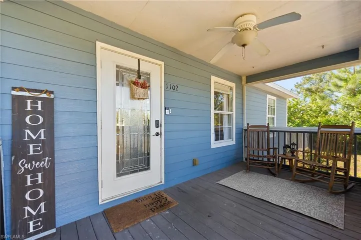 Deck featuring ceiling fan and covered porch