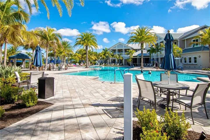 Community pool with a patio area