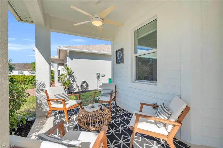 View of patio / terrace with 2 ceiling fans