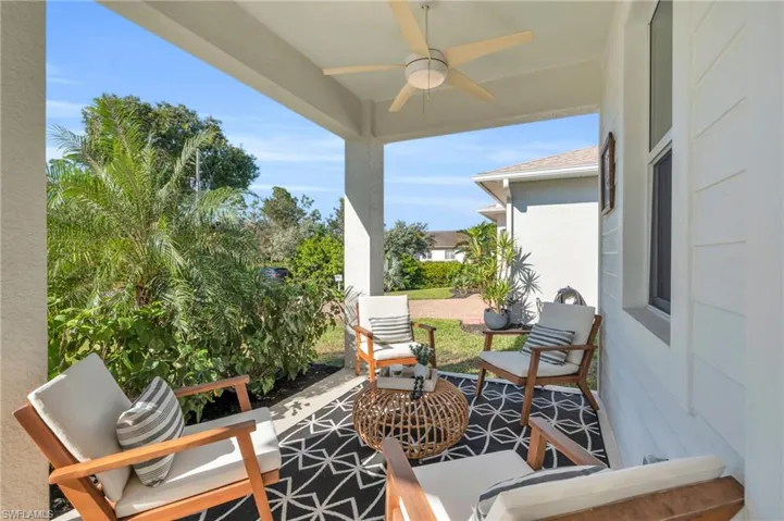 View of patio / terrace with ceiling fans
