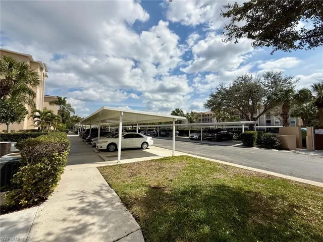 View of partially covered parking lot