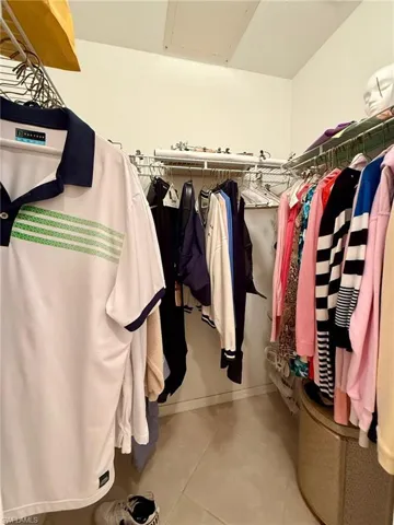 Walk in closet featuring light tile patterned floors