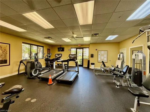 Exercise room with a paneled ceiling