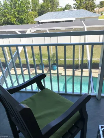 Outdoor pool featuring a fenced backyard