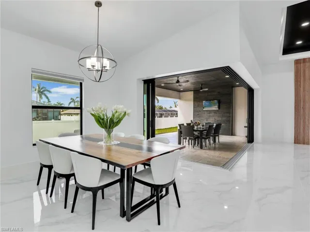 Dining space featuring marble tiled floors