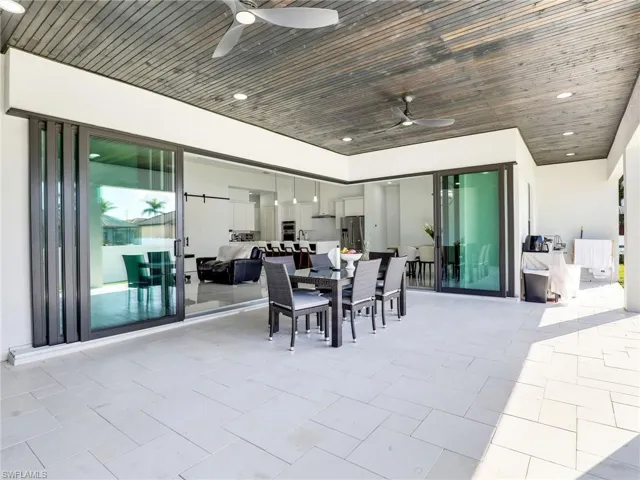 View of patio / terrace featuring a ceiling fan and outdoor dining area