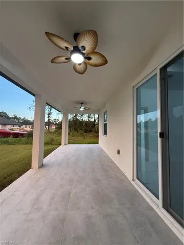 View of patio featuring ceiling fan