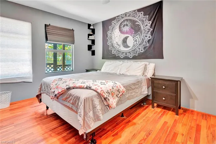 Bedroom featuring light wood flooring