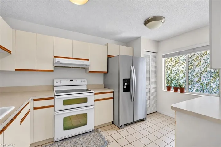 5744 Woodmere Lake Cir G-203, Naples, Florida 34112