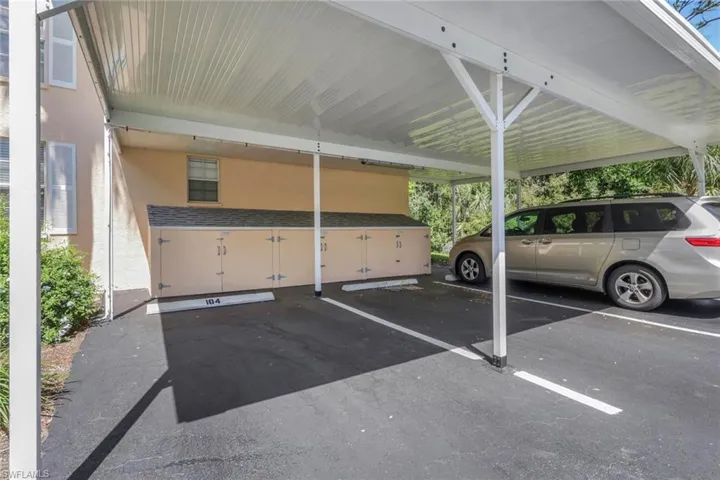 This unit has a covered carport w/additional storage, and a designated guest parking spot