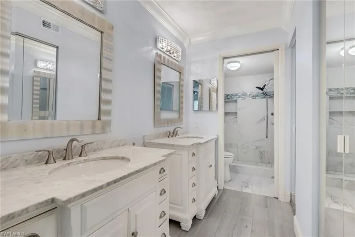 This master bath ensuite is opulent and lavish