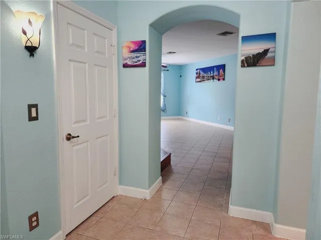 Foyer featuring light tile floors