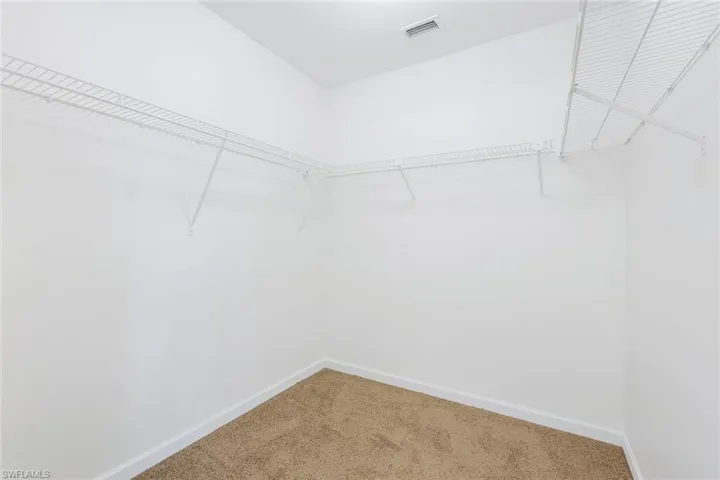 WALK-IN CLOSET IN MASTER BEDROOM
