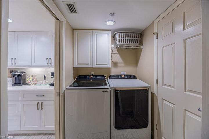 laundry room next to storage room