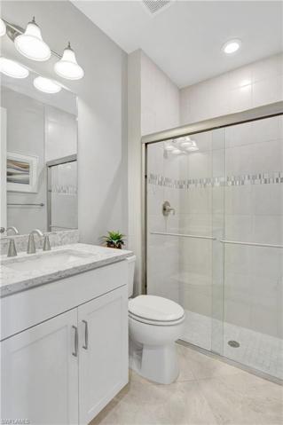 7615 Winding Cypress DR, NAPLES FL 34114