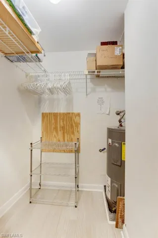 walk in closet in primary bedroom