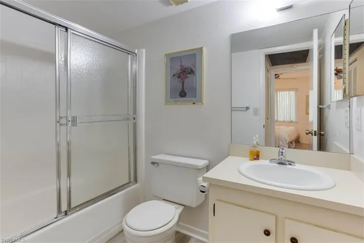 Guest bath tub and shower combination   just steps from guest bedroom
