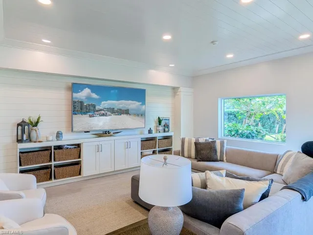 Living room with wood-type flooring