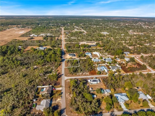 View of property location featuring nearby suburban area